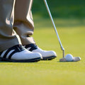 Golfer putting.